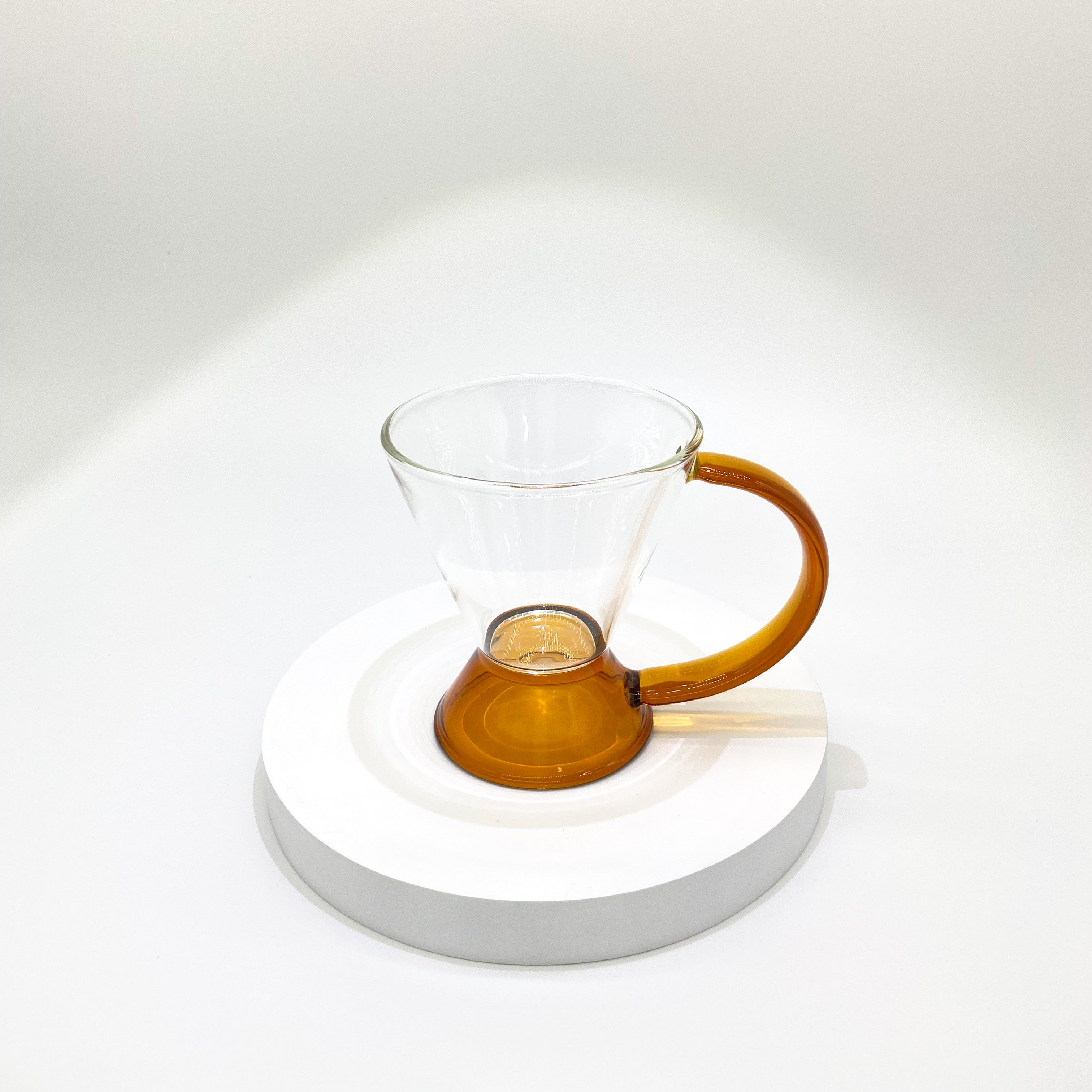 https://seesecscore.com/cdn/shop/files/amber-drinking-cup-for-morning-tea.jpg?v=1690447392&width=3024
